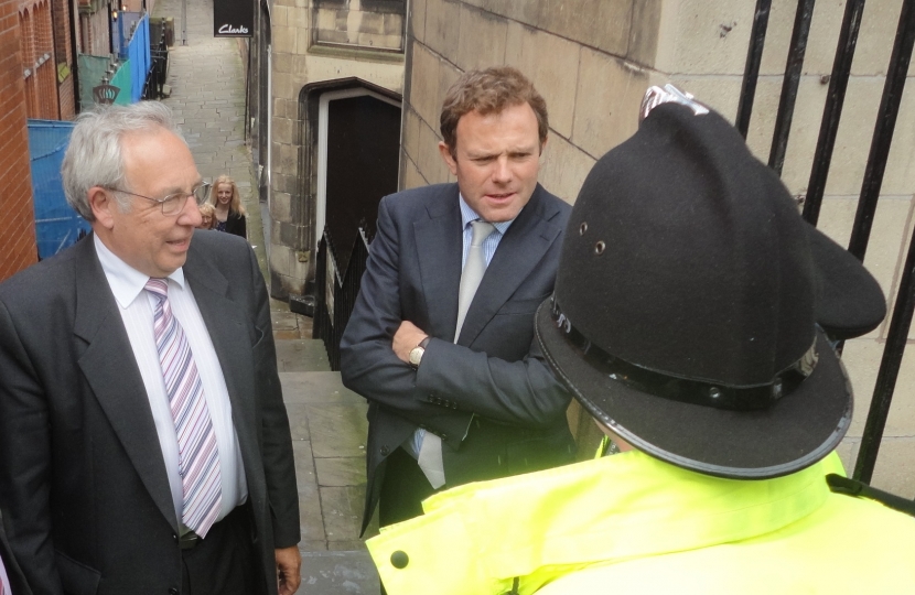 Picture ; John Dwyer and Policing Minister Nick Herbet talking to officers in Ch
